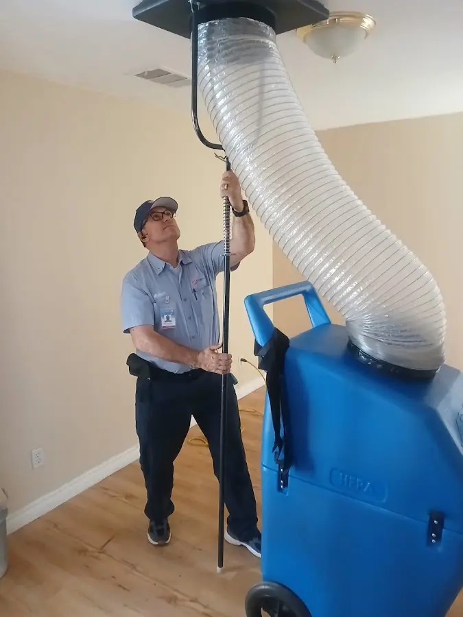 HVAC Installation technician using HEPA equipment in Merrifield